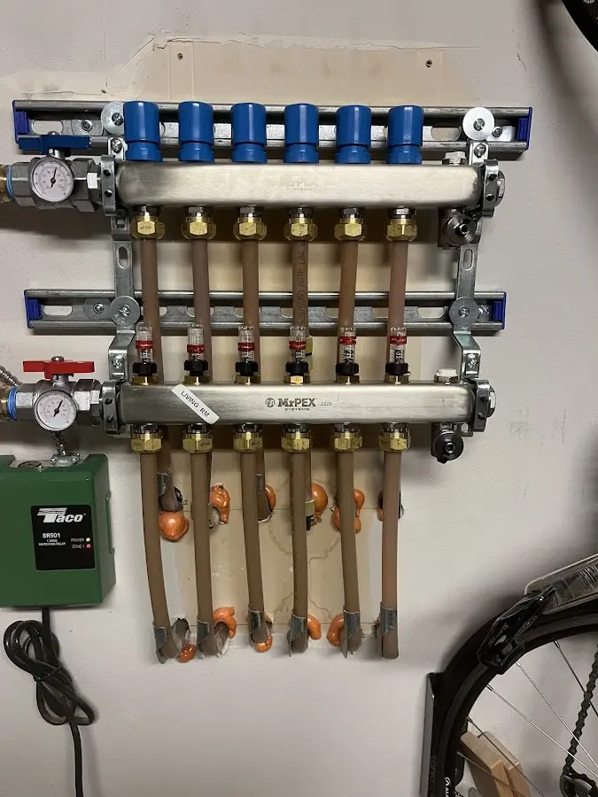 Plumber performing Water Heater Repair at a residential property in Vadnais Heights